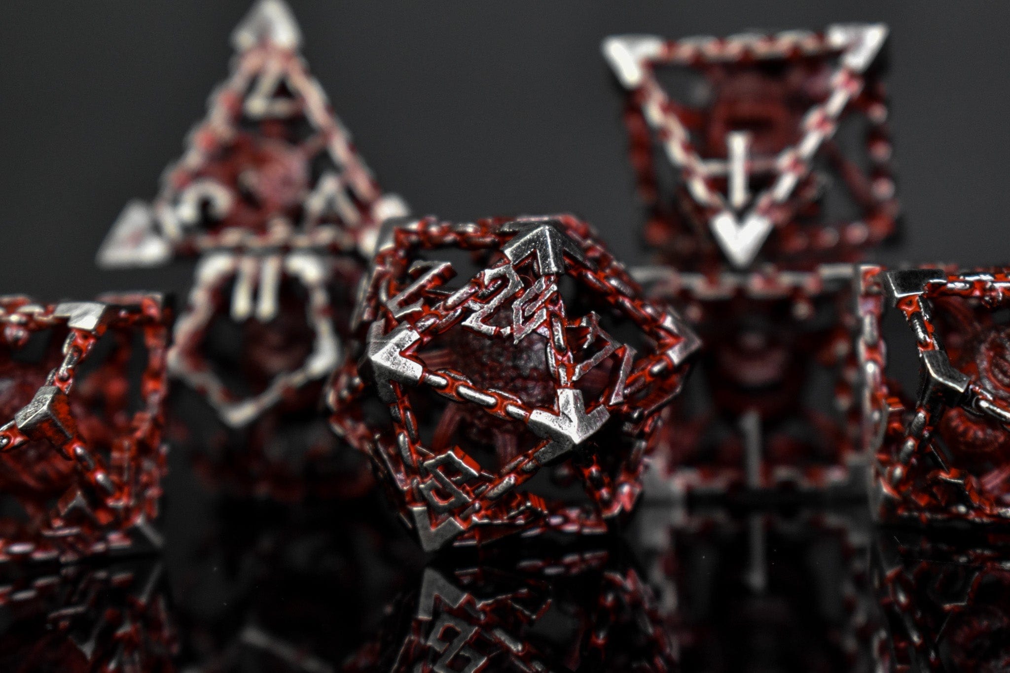Misty Mountain Gaming hollow Beholder's Gates Hollow Metal Dice Set - Bloodied Silver