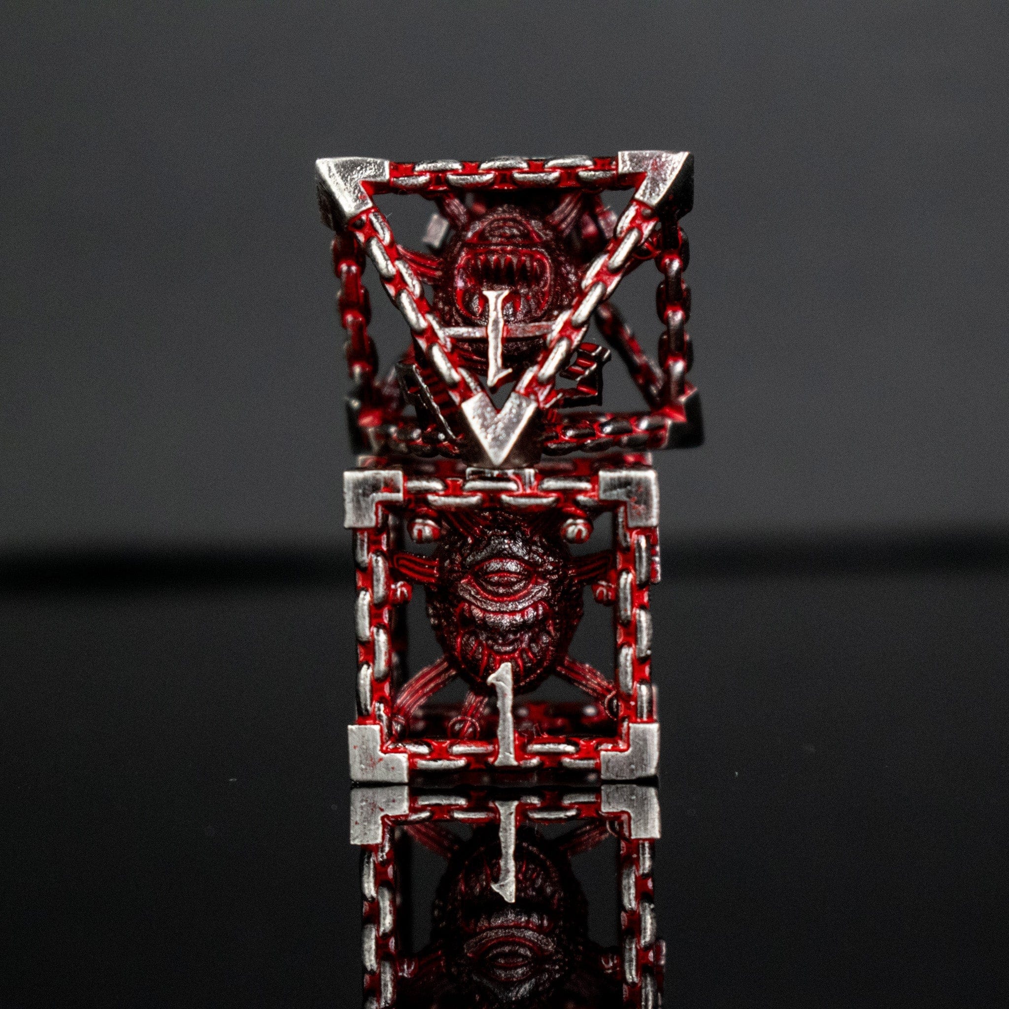 Misty Mountain Gaming hollow Beholder's Gates Hollow Metal Dice Set - Bloodied Silver