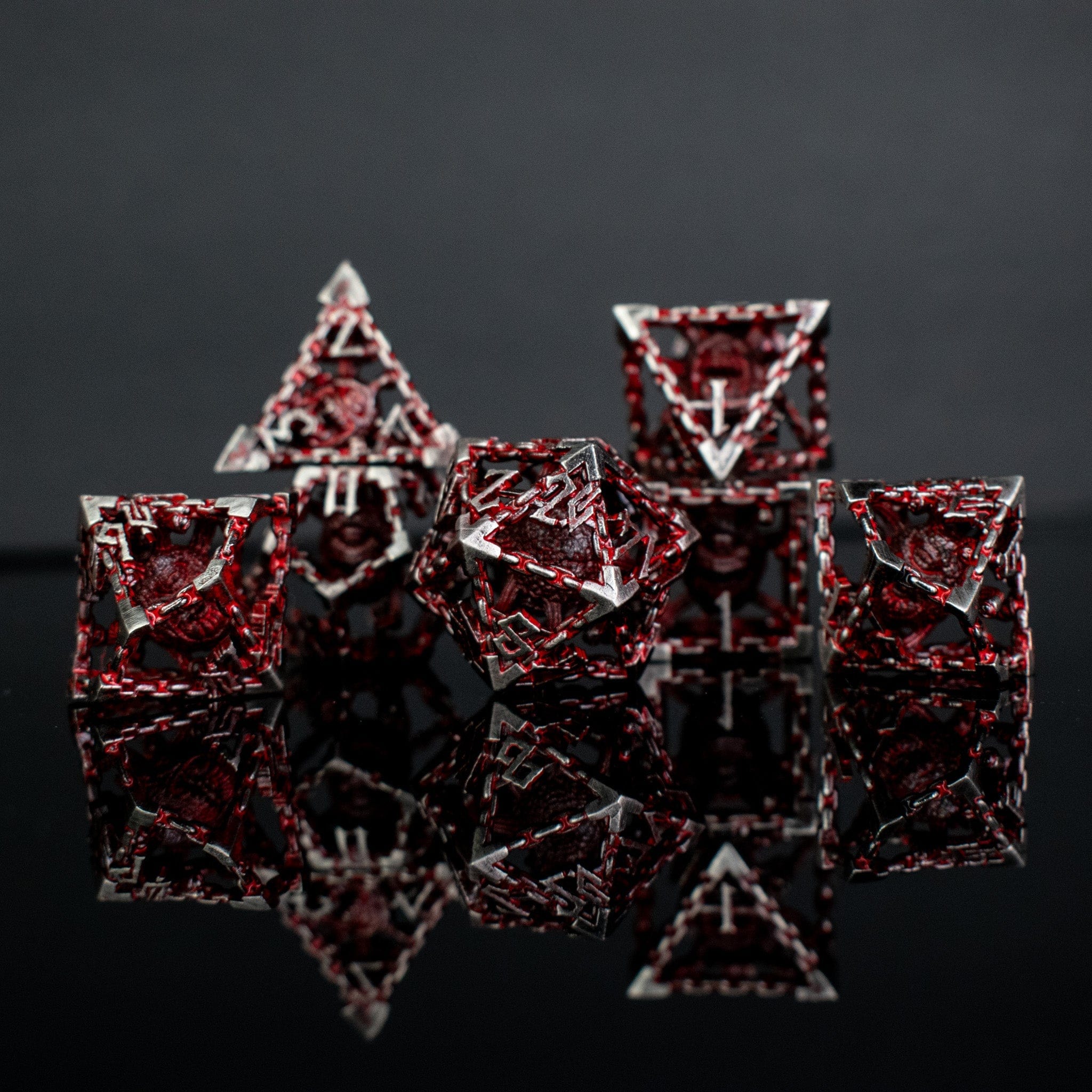 Misty Mountain Gaming hollow Beholder's Gates Hollow Metal Dice Set - Bloodied Silver