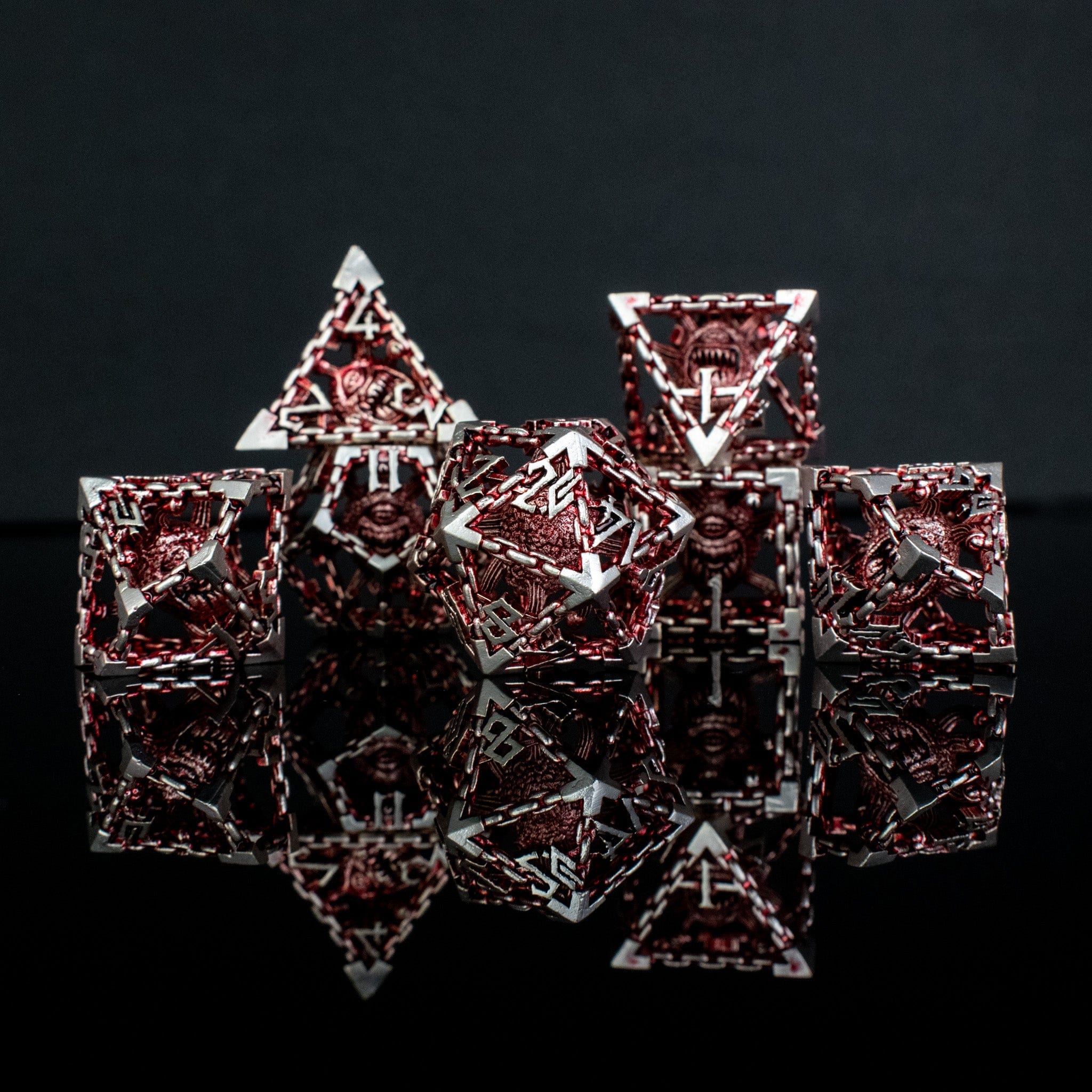 Misty Mountain Gaming hollow Beholder's Gates Hollow Metal Dice Set - Red and Silver
