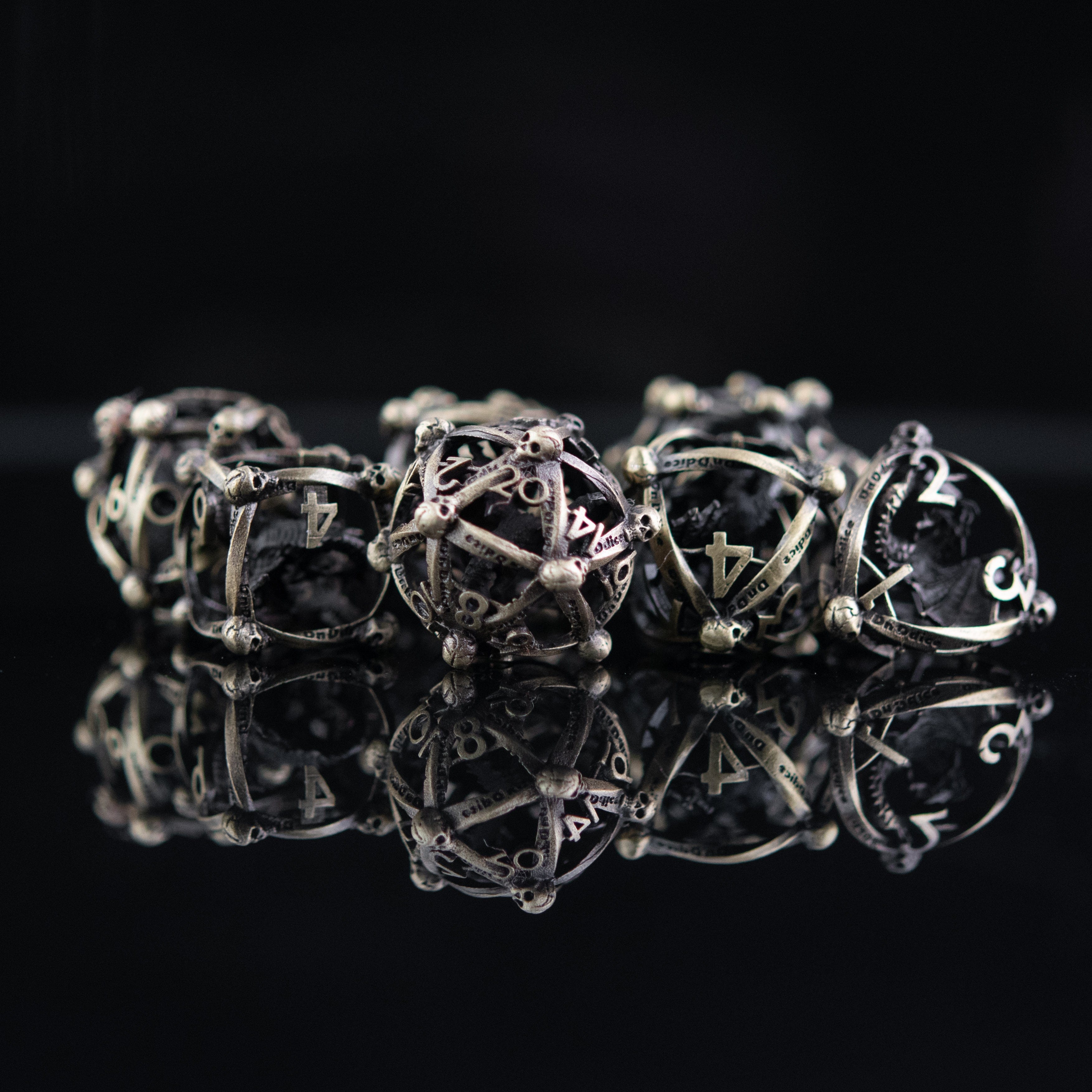 Misty Mountain Gaming hollow Draco Immortui Hollow Metal Dice Set - Champagne Gold