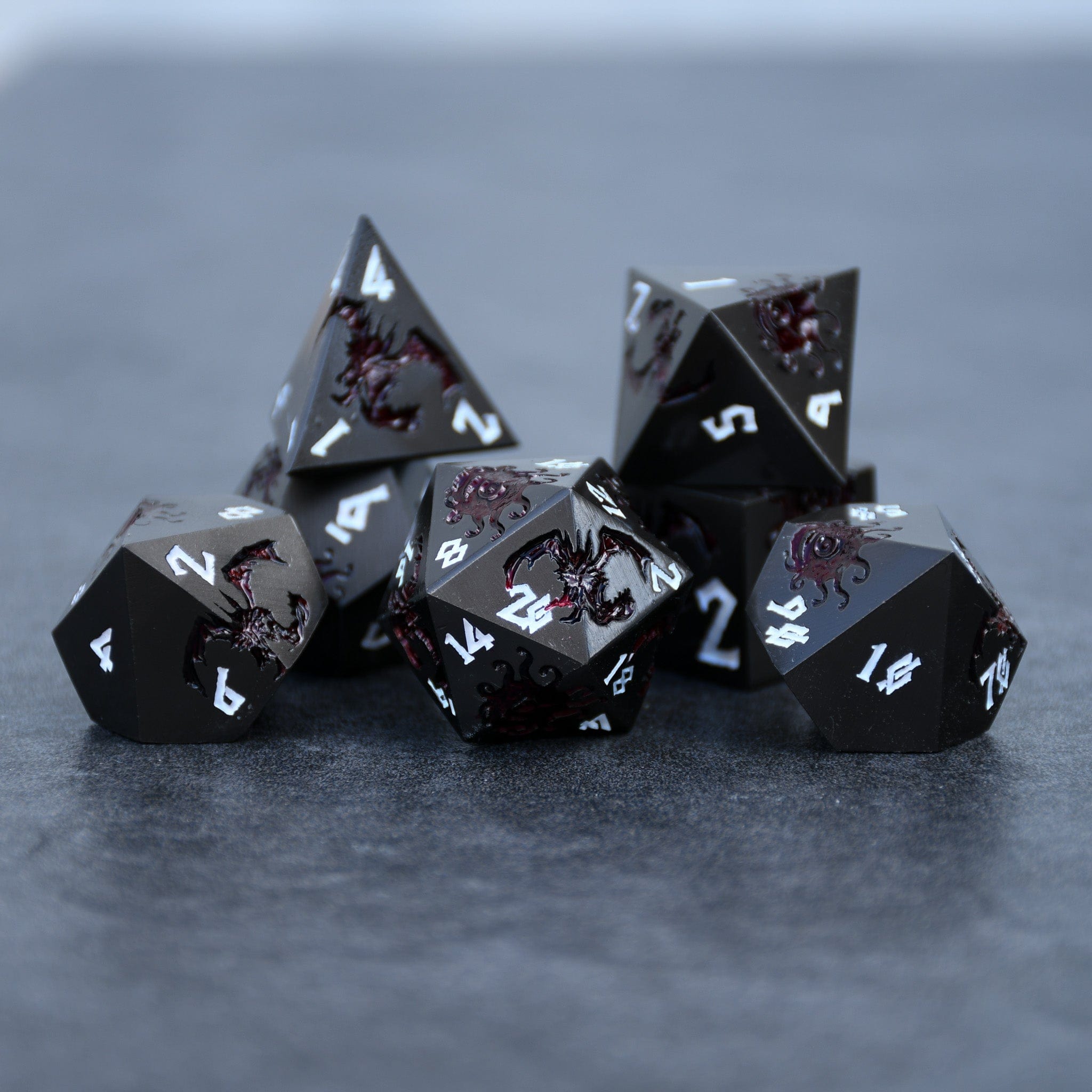 Misty Mountain Gaming Metal Monster Manual Dice - Gunmetal and Crimson