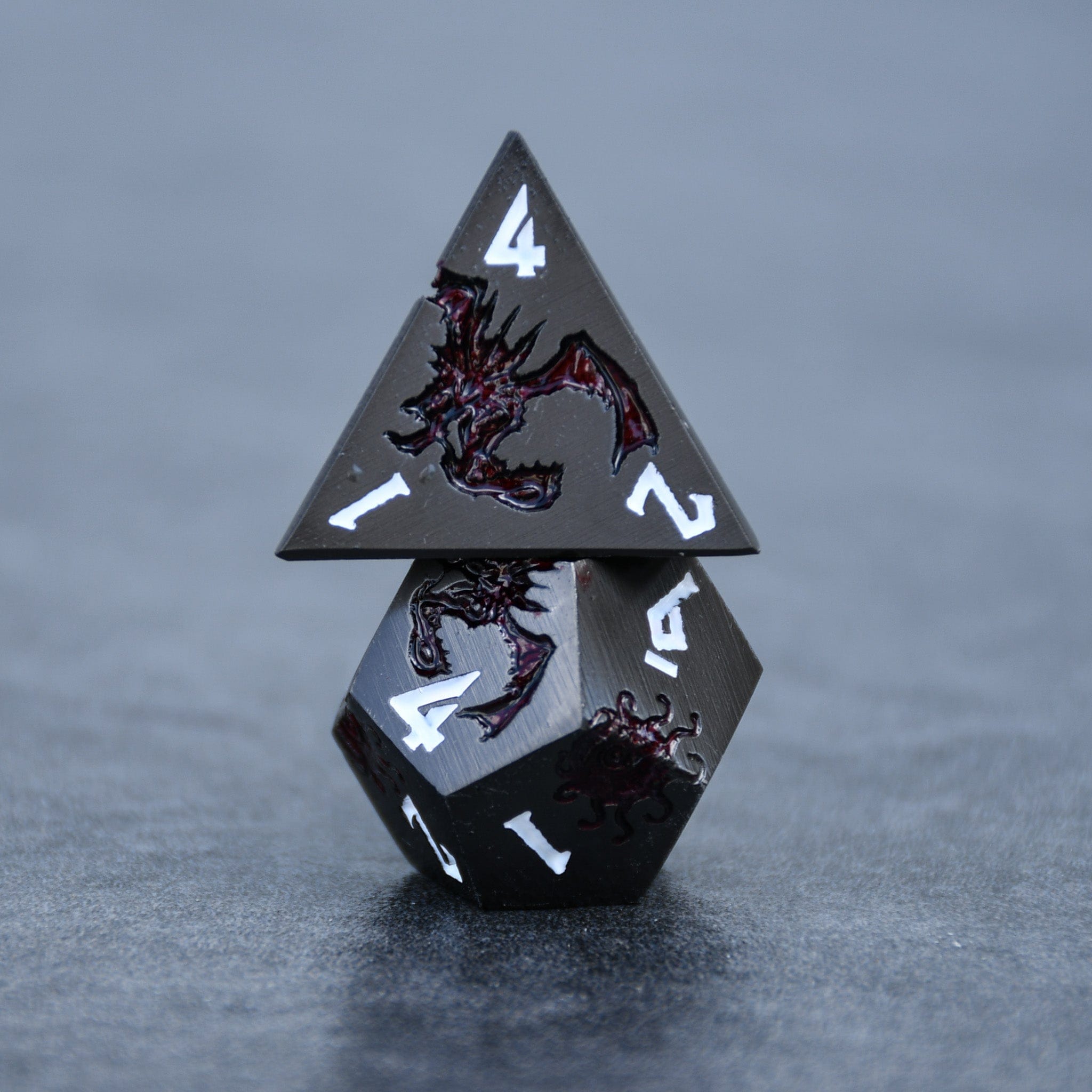 Misty Mountain Gaming Metal Monster Manual Dice - Gunmetal and Crimson