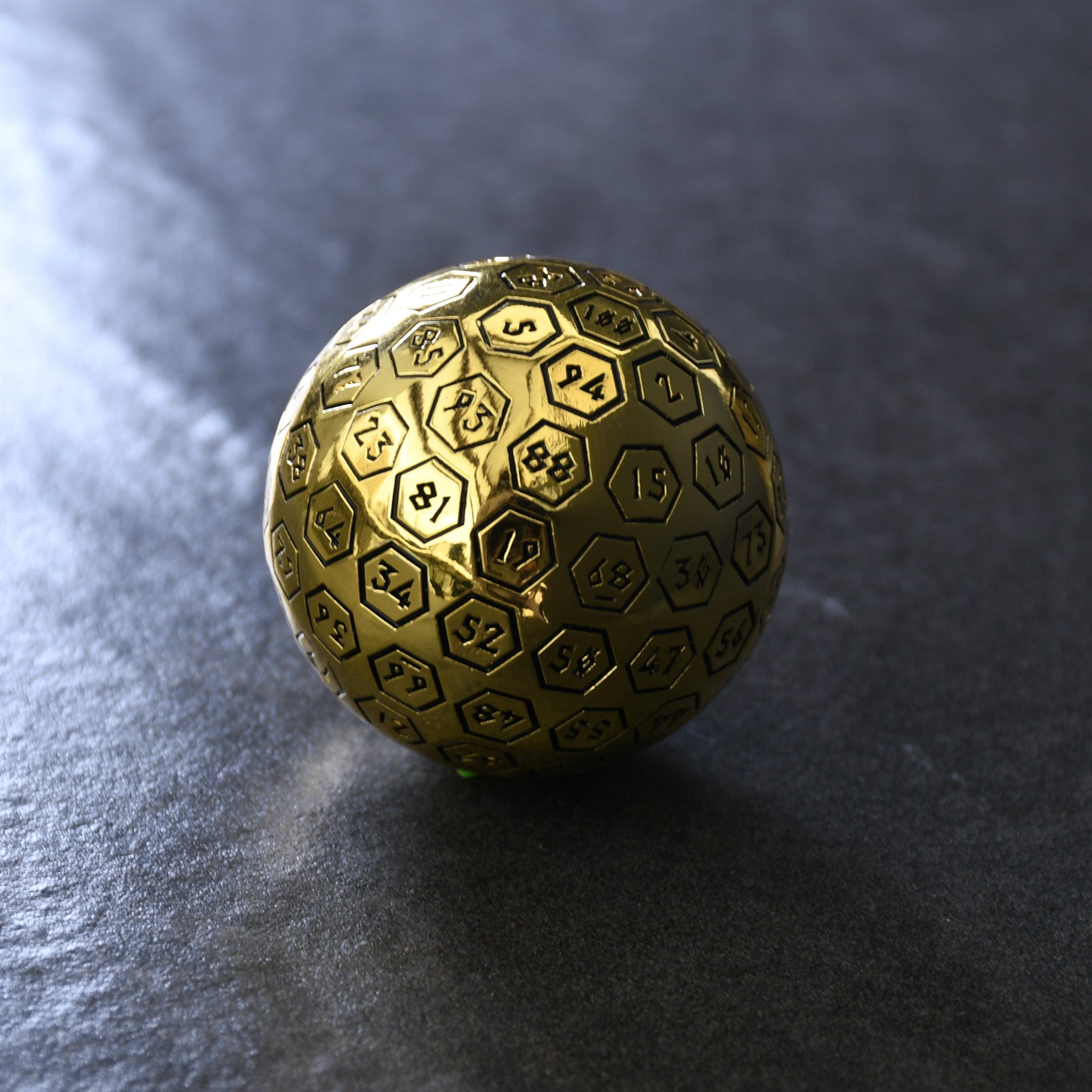 Misty Mountain Gaming D100 The Orb D100 -  Black and Gold Metal Die